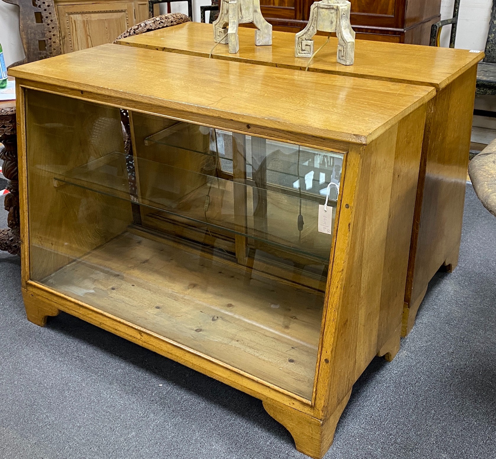 A pair of mid century oak haberdashery cabinets, width 104cm depth 56cm height 90cm